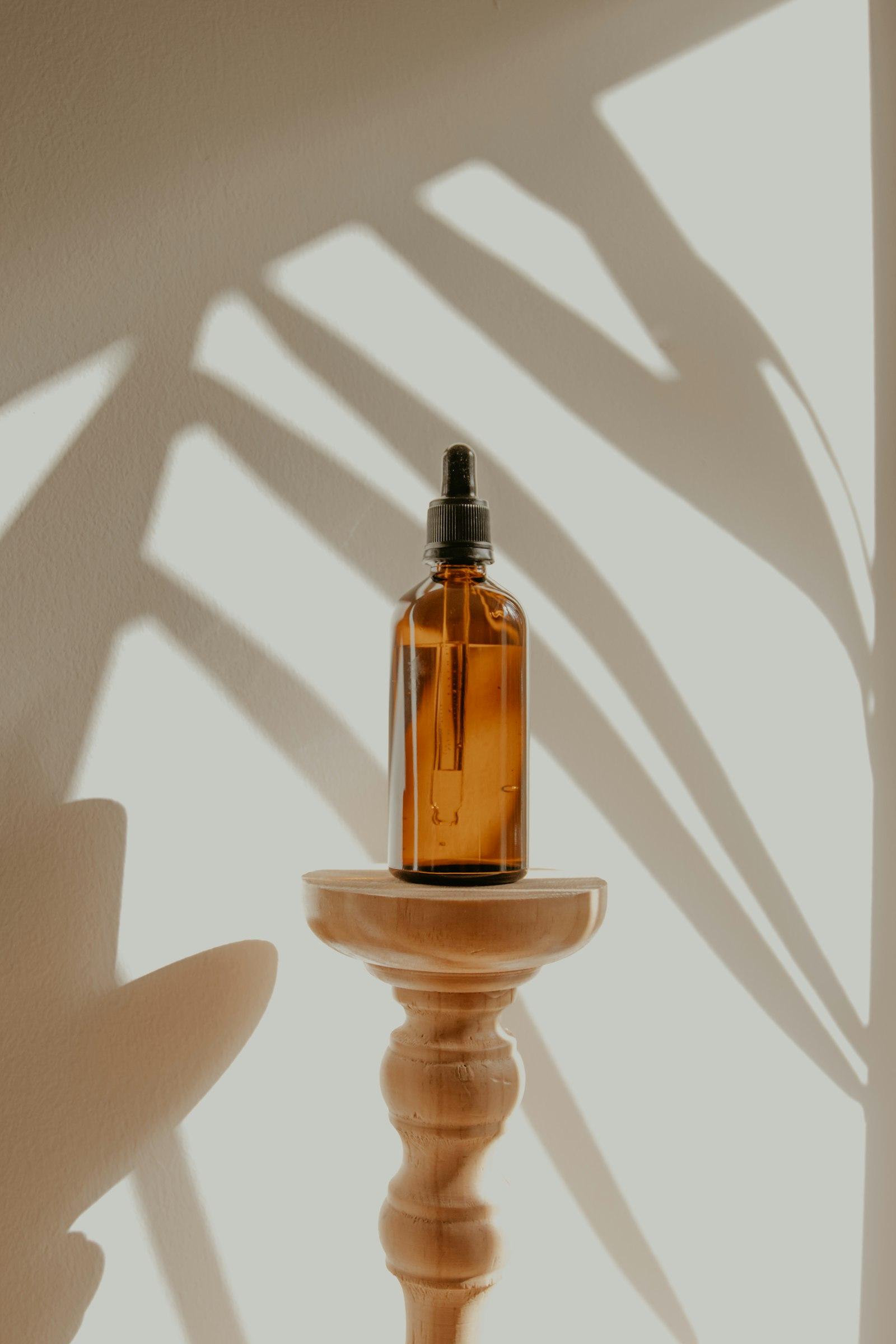 Amber oil in a glass dropper bottle